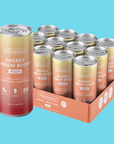 Twelve peach-flavored energy drink cans with gradient yellow-to-red labels in a cardboard box.
