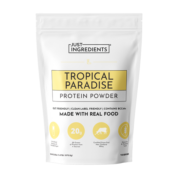 Tropical Paradise Protein Powder pouch — white pouch with yellow label showing 20g protein per serving