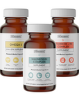 Three amber glass supplement bottles labeled Omega-3, Magnesium Complex, and Vitamin D3 + K2 Complex with white caps.