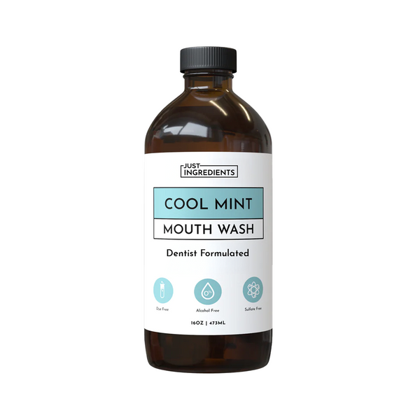 Brown glass bottle of Cool Mint remineralizing mouthwash with white label, 16 fl oz, front view