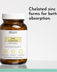 Amber glass bottle of Zinc Complex supplement with white cap and label indicating 60-day supply of capsules.