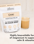 Pouch of "Chai Nighttime Relax" with a glass of chai beverage beside it, featuring no sugar added and magnesium benefits.