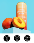Peach-flavored Energy + Brain Boost beverage can next to fresh peach halves on blue background.