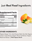 Supplement facts label with mango and lemon slices, listing collagen peptides, carbohydrates, protein, and ingredients includ