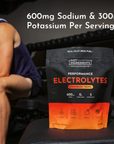 Black and orange pouch of Just Ingredients Performance Electrolytes in Strawberry Tropic flavor with nutritional information