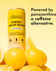 Yellow can of lemonade energy drink surrounded by fresh lemon halves and whole lemons on a yellow background.