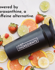 Black shaker bottle with Just Ingredients logo surrounded by strawberries, lemons, limes, and oranges.