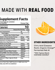 Orange slices next to a supplement facts label listing ingredients including vitamin C, magnesium, potassium, and organic ora