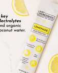 Lemonade electrolytes stick with five key electrolytes and organic coconut water, featuring a lemon slice.