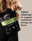 A woman holds a black pouch labeled "Strawberry Limeade Pre-Workout" with nutritional information visible.