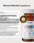 Brown glass supplement bottle labeled "Prenatal Iron Supplement" with white cap, GMP certification seal, and supplement facts