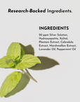 Ingredients list including silver solution, hydroxyapatite, and various plant extracts with a mint leaf in the foreground.