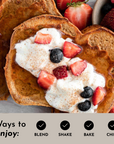 Heart-shaped pancakes topped with yogurt, strawberries, and blueberries, with a list of preparation methods below.