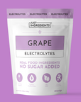 Purple pouch of grape electrolyte powder, front label showing 30 servings and 'no sugar added'.