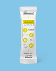 Single lemonade electrolyte stick packet showing front packaging with ingredient highlights