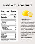 Black Just Ingredients shaker bottle surrounded by fresh strawberries, oranges, lemons, and limes.