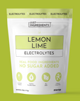 Pouch of Lemon Lime Electrolytes powder — 30 servings, front packaging showing lemon and lime graphics and 'no sugar added' callout.