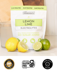 Pink benefits graphic listing key features of Lemon Lime Electrolytes with checkmarks (real fruit, no artificial sweeteners, balanced electrolytes).