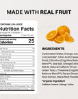 Single can of Orange Fizz Energy + Brain Boost next to fresh oranges on a yellow background.
