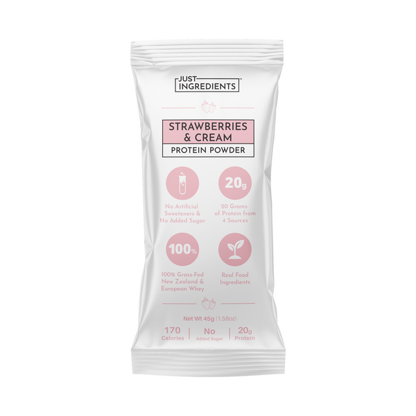 White packaging with pink accents featuring "Strawberries & Cream Protein Powder," highlighting protein content and ingredien