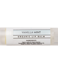 Cylindrical lip balm tube labeled "Vanilla Mint Organic Lip Balm" with ingredients list on white label.