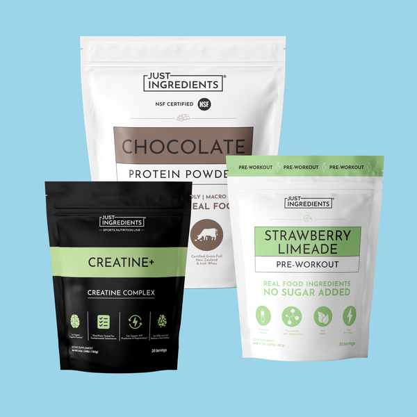 Three supplement pouches: chocolate protein powder, creatine complex, and strawberry limeade pre-workout drink mix on blue ba
