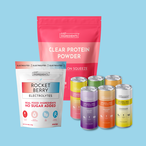 Just Ingredients clear protein powder and electrolyte products including pink powder pouch, rocket berry packet, and six colo