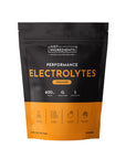 Black and orange pouch of Just Ingredients Performance Electrolytes in orange flavor with product information and icons on pa