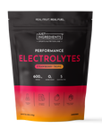Black pouch with pink and orange gradient base displaying "Performance Electrolytes Strawberry Tropic" text and nutritional i