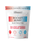 White pouch of Rocket Berry Electrolytes powder with red and blue gradient header and product icons for ingredients.