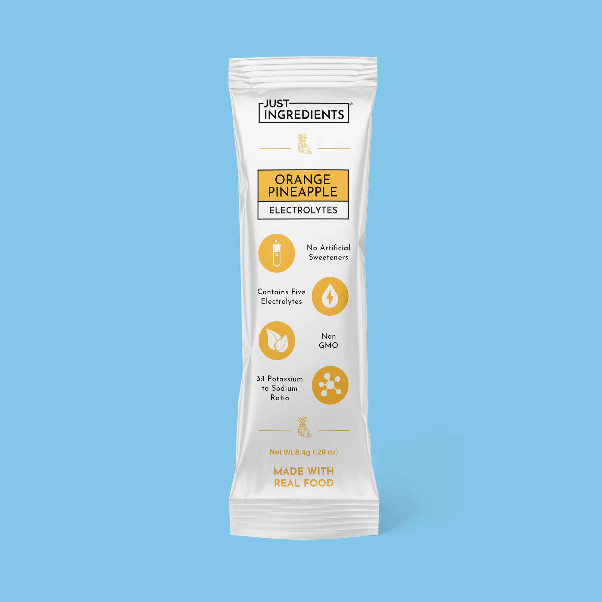 Silver electrolyte stick packet labeled Orange Pineapple with nutrition facts and ingredient details visible.