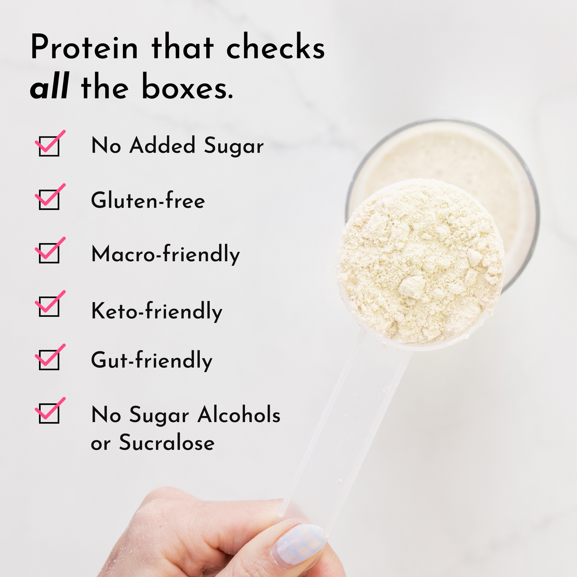 Cream-colored protein powder in a glass bowl with a hand holding a scoop below.