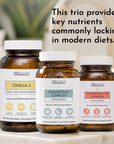 Three amber glass supplement bottles with white caps labeled Omega-3, Magnesium Complex, and Vitamin D3 + K2.