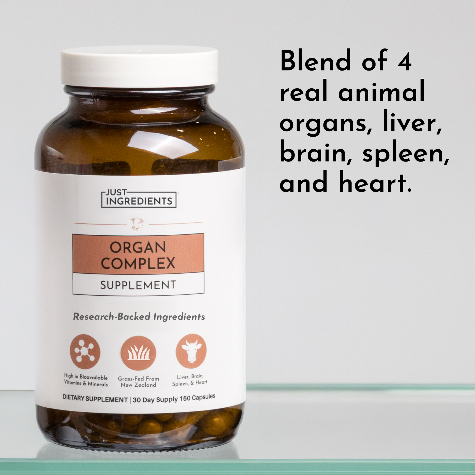 Brown glass supplement bottle labeled "Organ Complex" containing 150 capsules with white cap.
