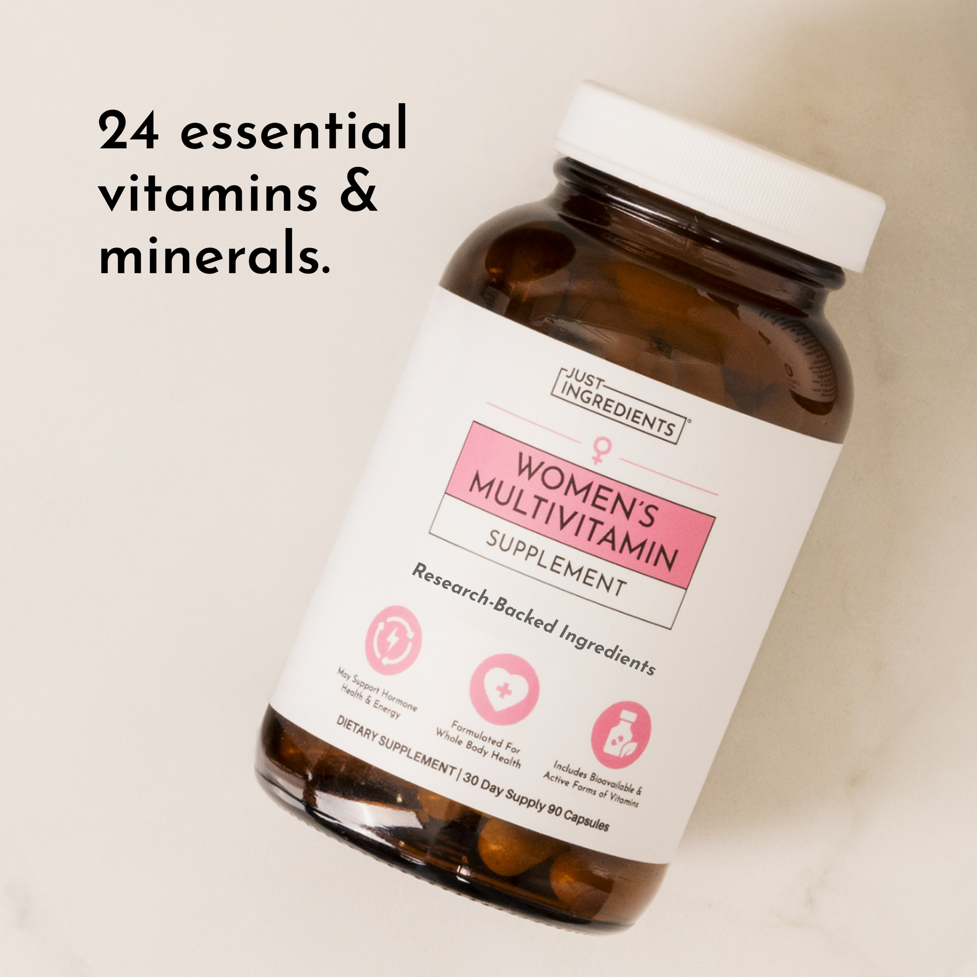 Brown glass bottle with white label reading "Women's Multivitamin Supplement" containing brown capsules.