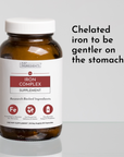 Brown glass bottle with white cap labeled "Iron Complex Supplement" containing 60 capsules.