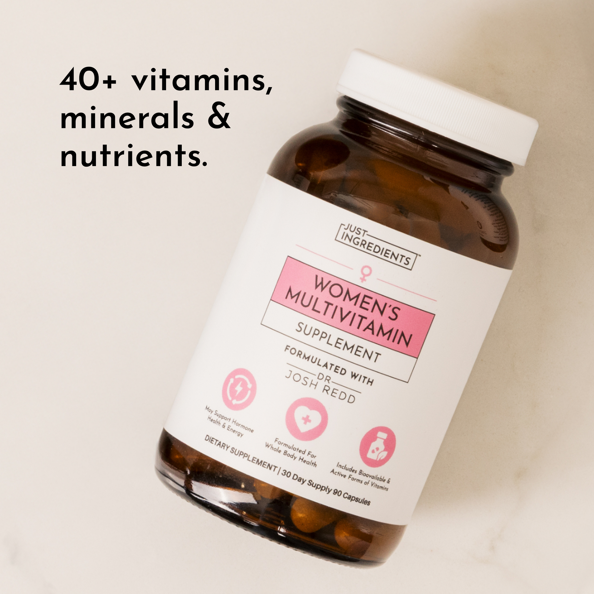 Brown bottle of women's multivitamin capsules with a white lid and a label detailing its contents and benefits.