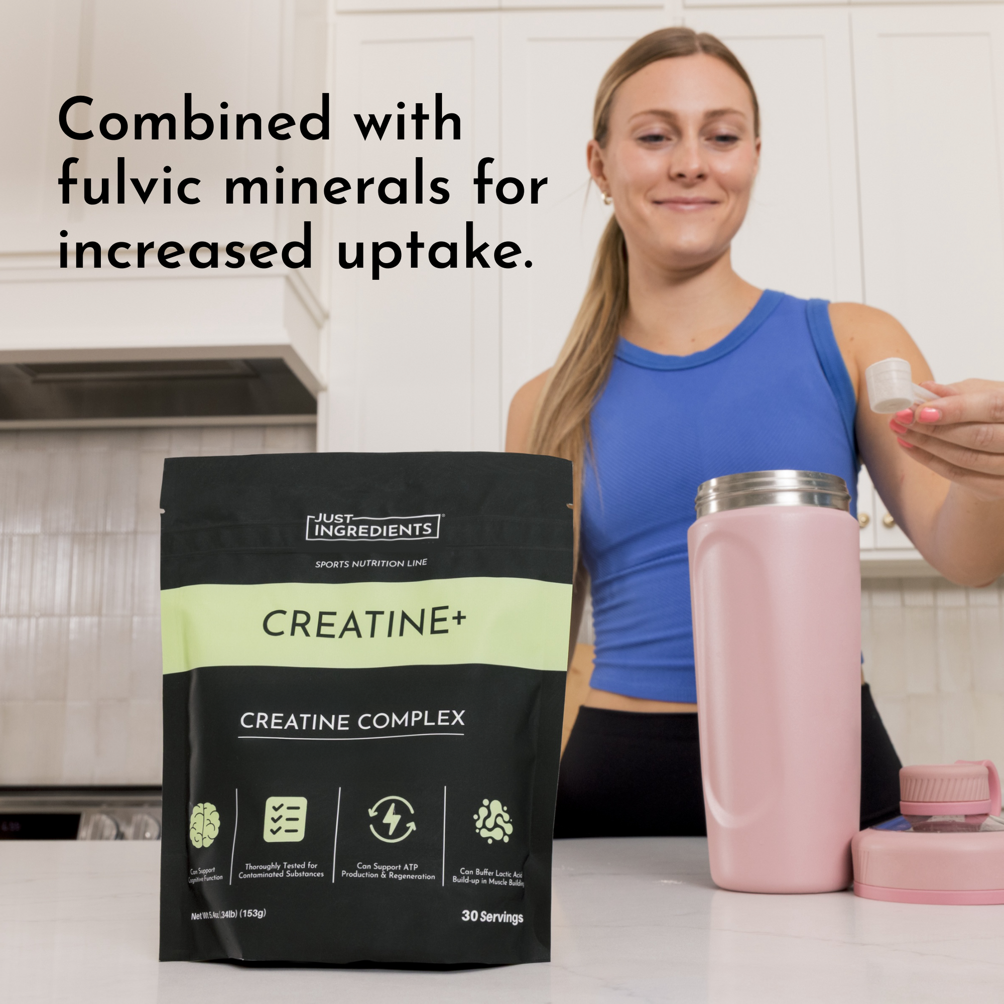 Black and lime-green Creatine+ powder pouch next to woman in blue tank top holding pink shaker bottle.