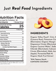 Peach halves with nutrition facts and ingredients list for electrolyte supplement on light background.