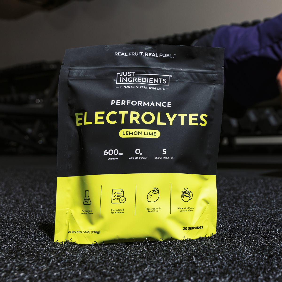 Black and yellow pouch of lemon lime electrolyte powder with nutrition information and icons displayed on front.