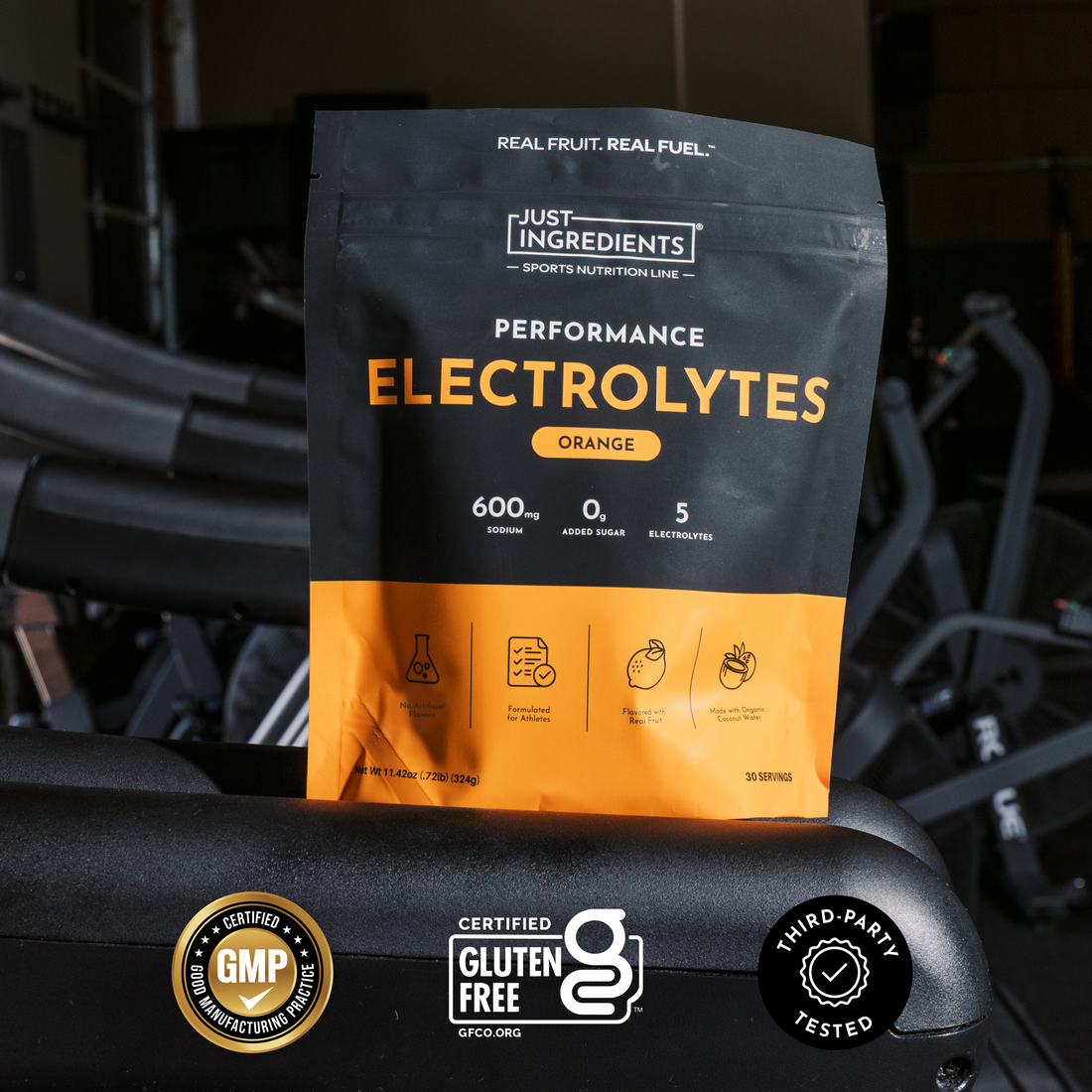 Black and orange pouch of Performance Electrolytes in orange flavor with nutrition information and certification badges displ