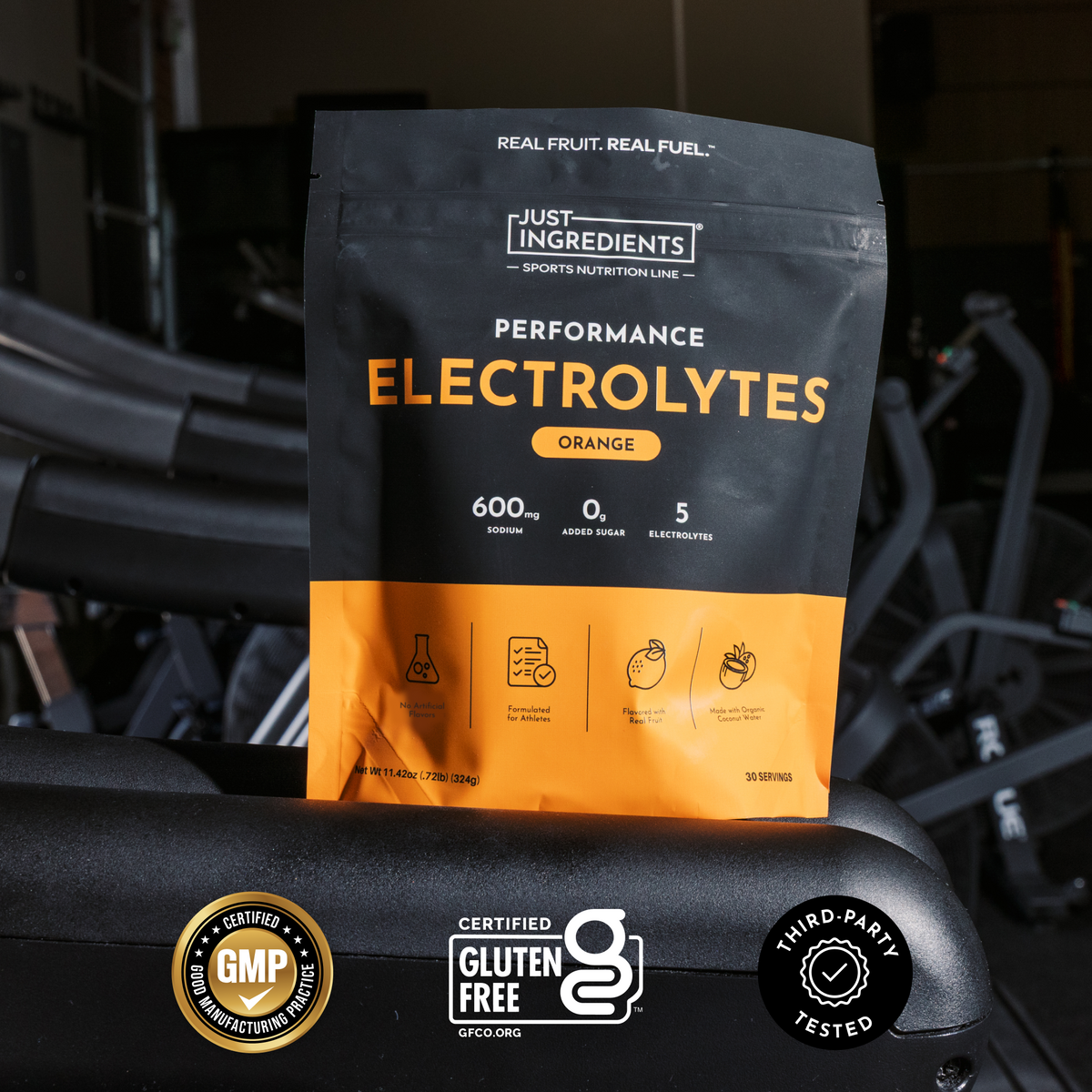 Black and orange pouch of Performance Electrolytes in orange flavor with nutrition information and certification badges displ