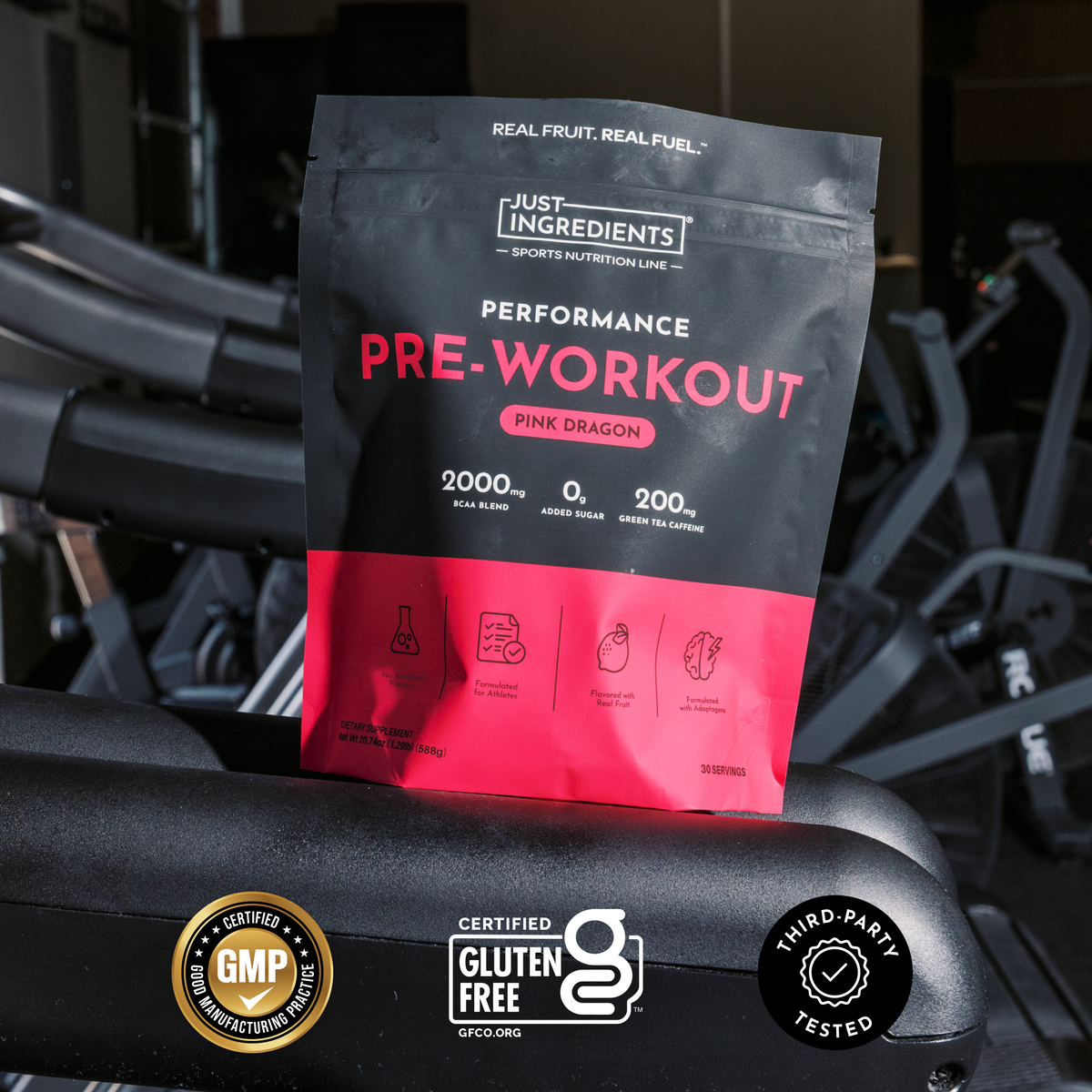 Black and pink pouch of Pink Dragon Performance Pre-Workout powder with ingredient icons and certification badges displayed o