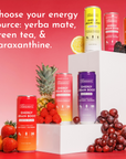 Variety pack of energy drinks displayed on a white pedestal with fruits in the foreground and a gradient background.