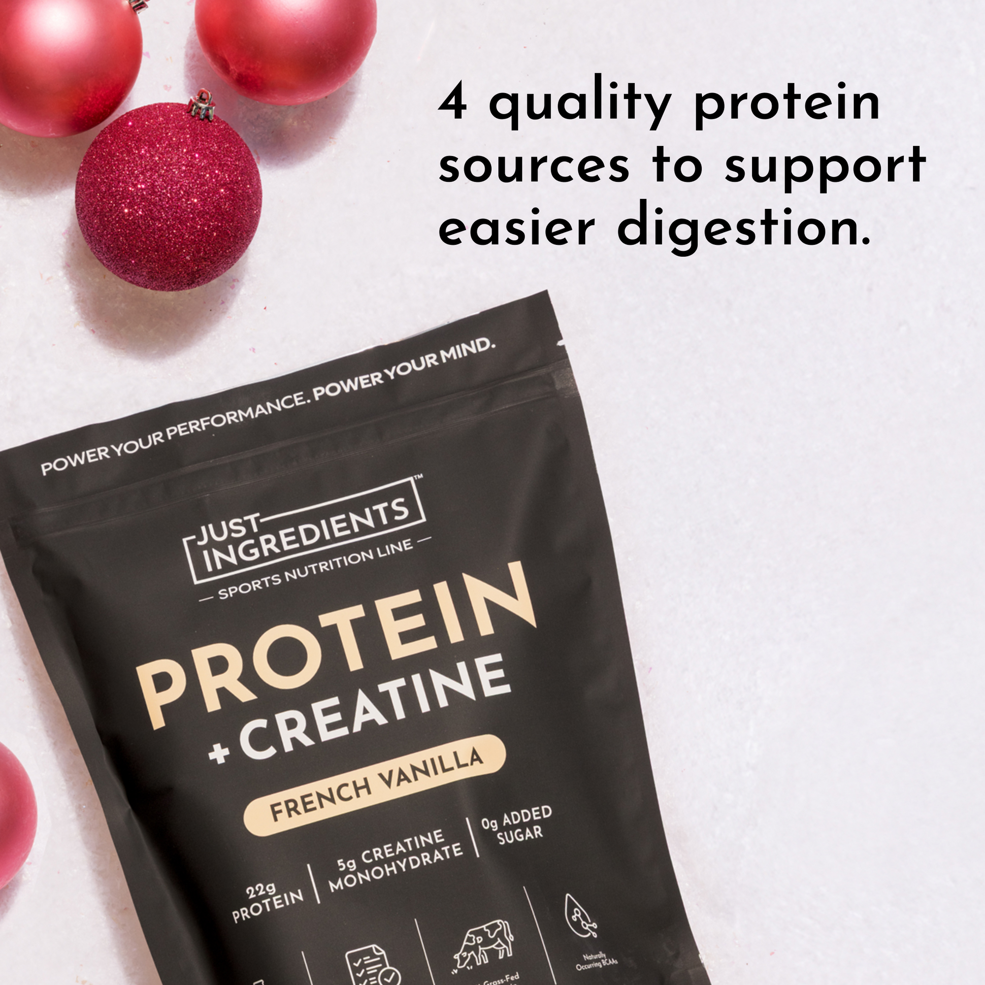 Black packaging of French Vanilla Protein + Creatine with nutritional details and decorative pink ornaments in the background