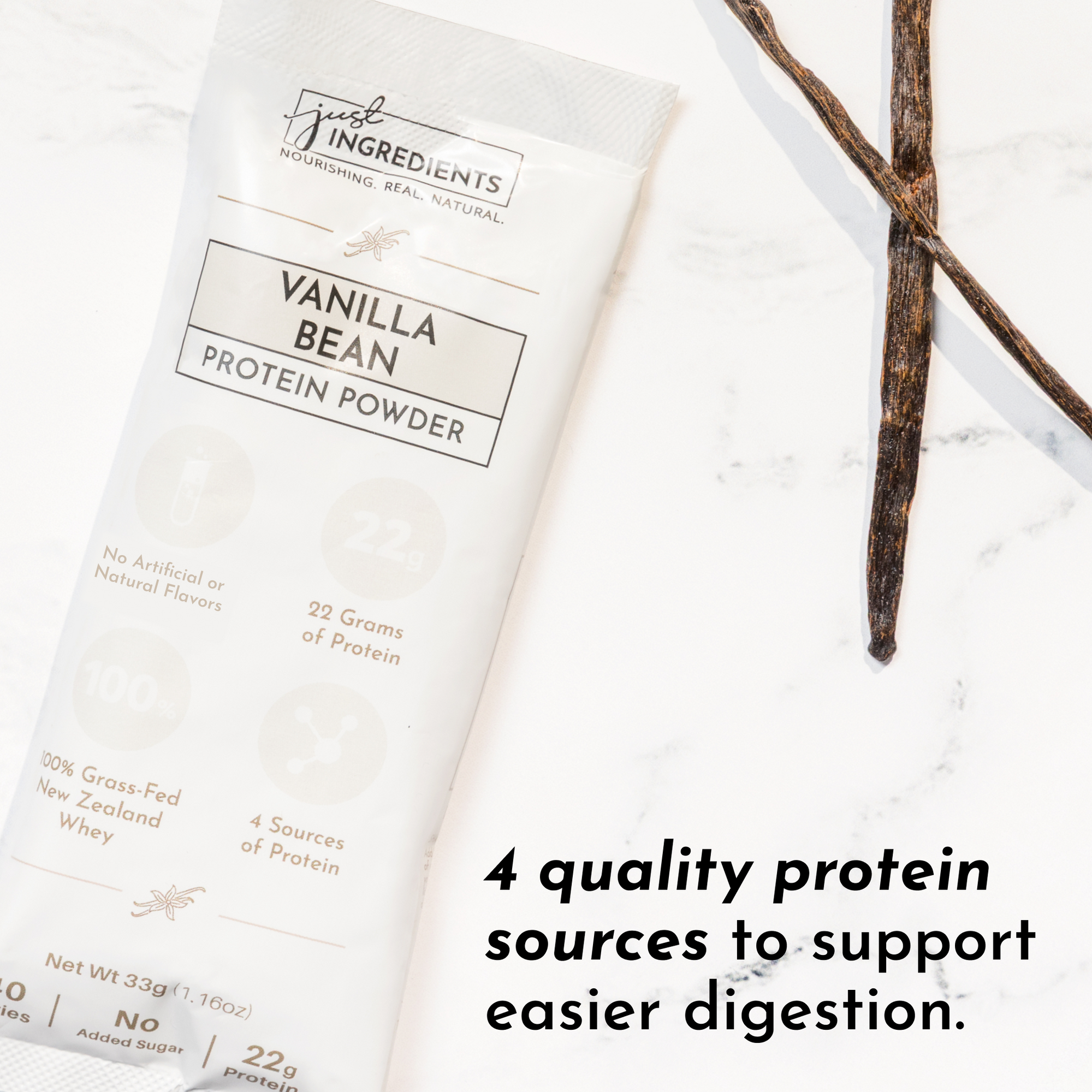 Vanilla bean protein powder stick with nutritional information and vanilla pods on a marble surface.