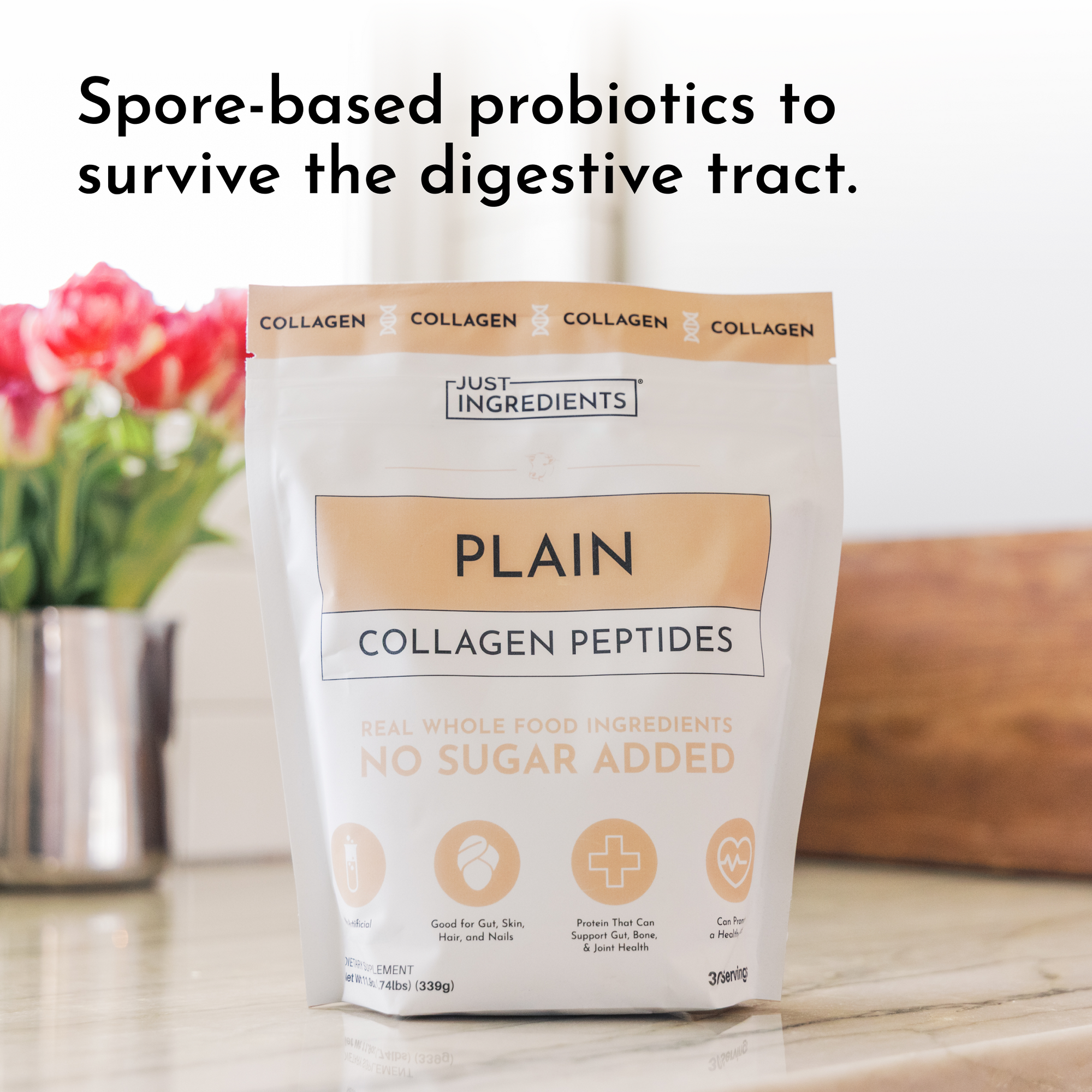 White pouch of Plain Collagen Peptides with tan label, displayed on counter with pink flowers and wooden box.