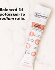 Electrolyte stick packet featuring guava mango flavor with nutritional information and ingredient details.