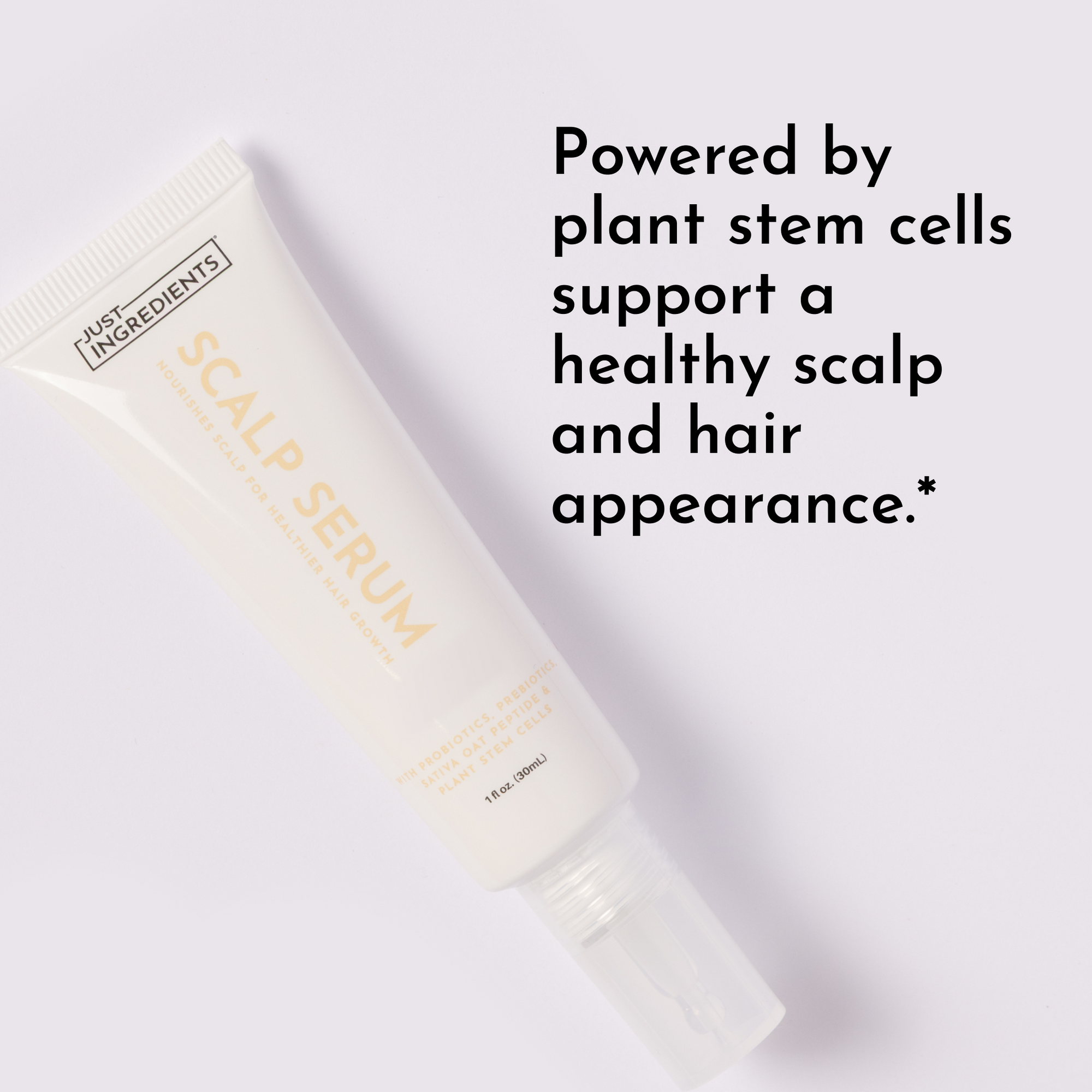 Cream-colored scalp serum tube labeled "Just Ingredients Scalp Serum" on light gray background.