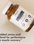 Brown glass bottle with white label reading "Men's Multivitamin Supplement" and ingredient icons on beige background.